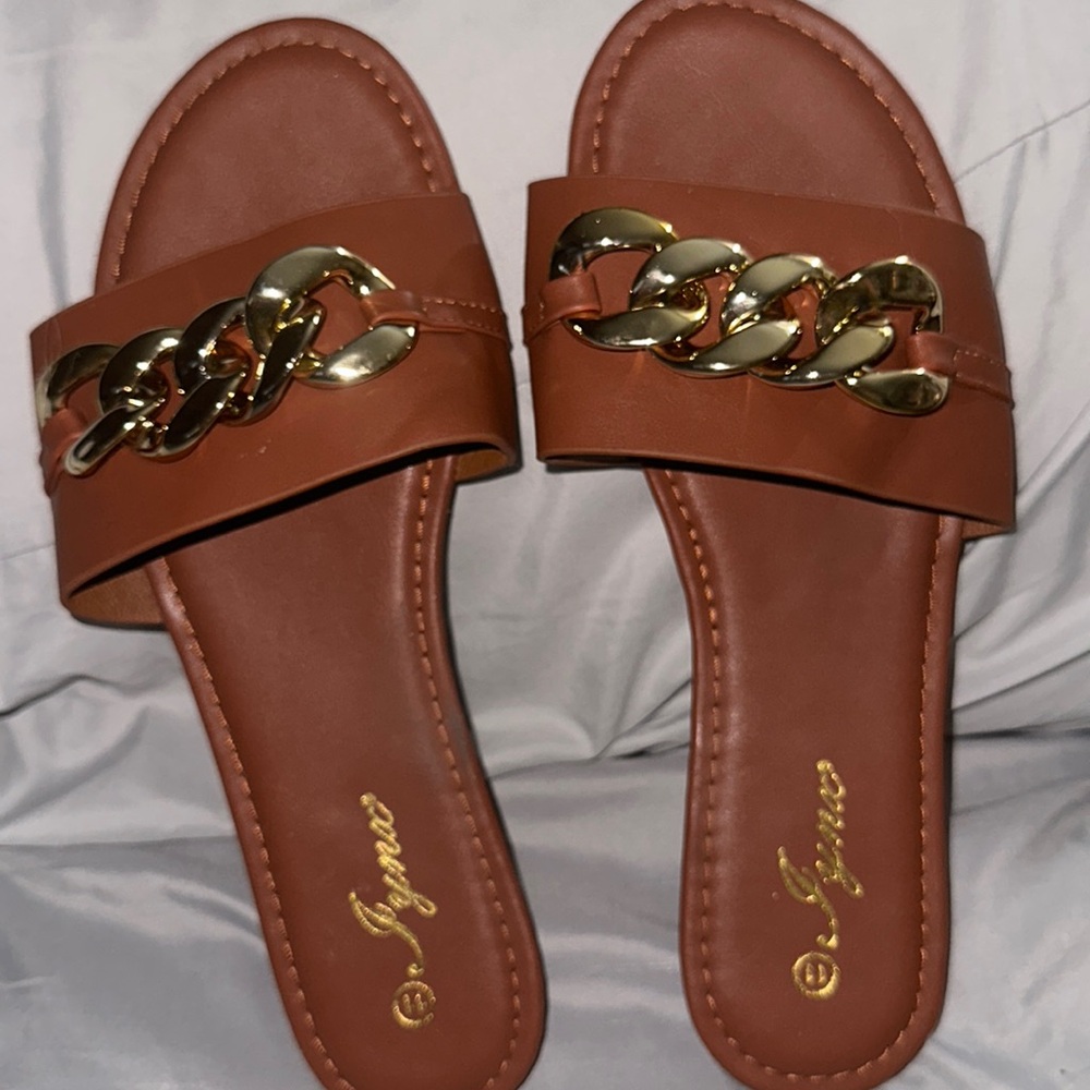 IYNX tan with gold chain across strap flats so cute size eleven barely worn
